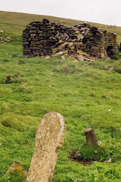 The Remains of St Ronan's Church, Rona. This photo shows the remains of St Ronan's Church, and part of the graveyard, on the remote island of Rona (Rònaidh, in Gaelic). It dates from the 8th century, and is one of the three oldest Christian churches in Scotland. See also HW8132.