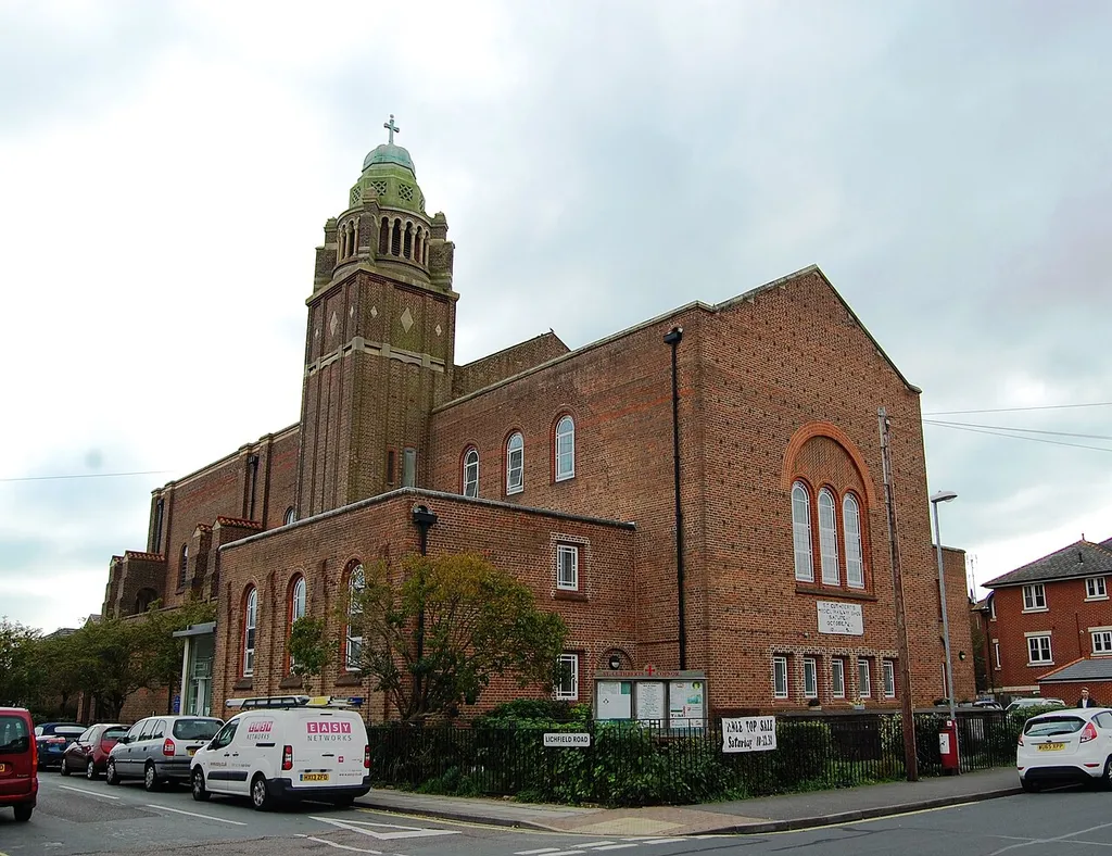 St Cuthbert's Church, Hayling Avenue, Copnor, City of Portsmouth, England. Built in 1915 to the design of Edwin Stanley Hall to serve the southern part of Copnor. It closed temporarily in 2003 so the interior could be converted into a doctors' surgery and community centre, incorporating a smaller worship area.