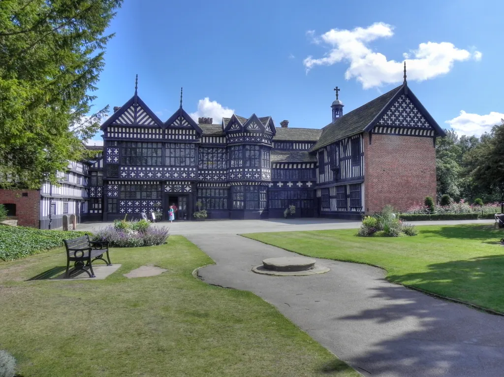 Bramall Hall viewed from the west, showing the main entrance, the courtyard and the north and south wings. The Great Hall is in the centre.