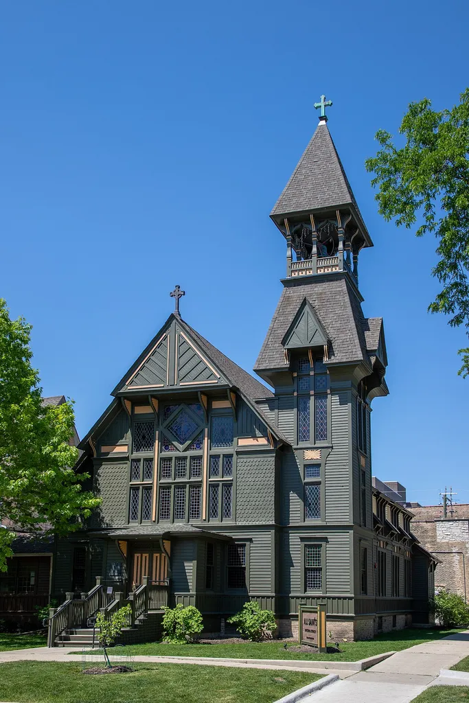 All Saints Episcopal Church, 4550 N. Hermitage Avenue, Chicago, Illinois. Constructed: 1883. Architect: John C. Cochrane, with stained glass by the firm of Healy &amp; Millet. It was built in the stick style, a rare example in Chicago. The structure is the city's oldest frame church; it was declared a Chicago Landmark in 1982. The bell both announced services and summoned volunteer fire department members in the community. A noted parishioner was Carl Sandburg, whose residence is located a block north of the church.