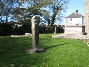 Wayside cross and cross-base in Camborne churchyard, 10m south west of the church