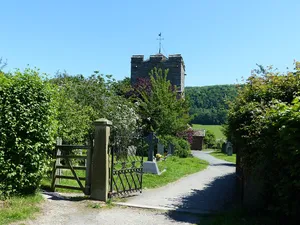 Gates and gate piers to churchyard of St John the Baptist