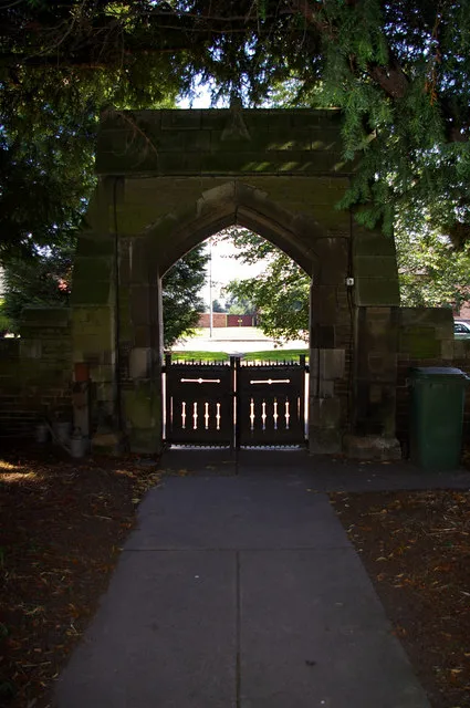 Arched gateway to St Bartholomew's parish churchyard, Eastoft, Lincolnshire, seen from the west