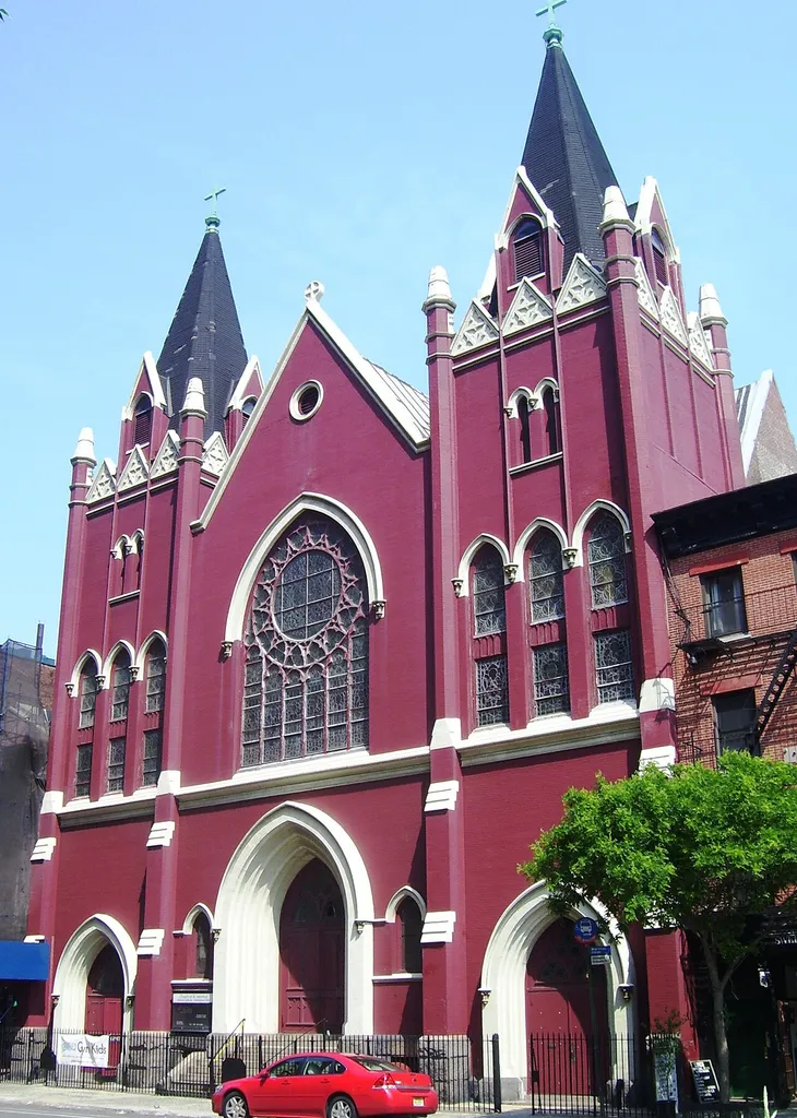 The Church of St. Veronica at 153 Christopher Street between Greenwich and Washington Streets in the West Village area of the Greenwich Village neighborhood of Manhattan, New York City was built in 1890 and 1902-1903 and was designed by John J. Deery in Victorian Gothic Revival style. The cornerstone was laid in March 1890 and the basement was completed in October 1890. The congregation used this as a sanctuary until sufficient money were raised to resume construction in 1902. It is located within the Greenwich Village Historic District Extension I. (Source: From Abyssinian to Zion (4th ed.) an "NYCLPC Greenwich Village Historic District Extension Designation Report")