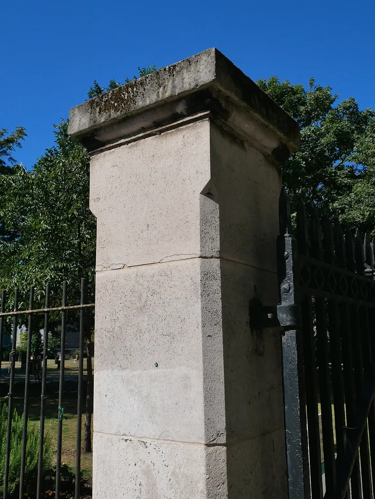 The Grade II listed gates and gate piers at the north east entrance to St Mary Magdalen's Churchyard in Bermondsey, London Borough of Southwark.