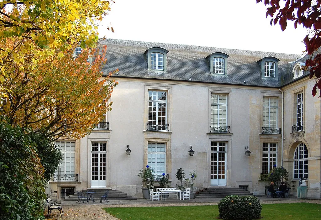 Courtyard garden and Hotel de Marle next street Payenne, Paris, France