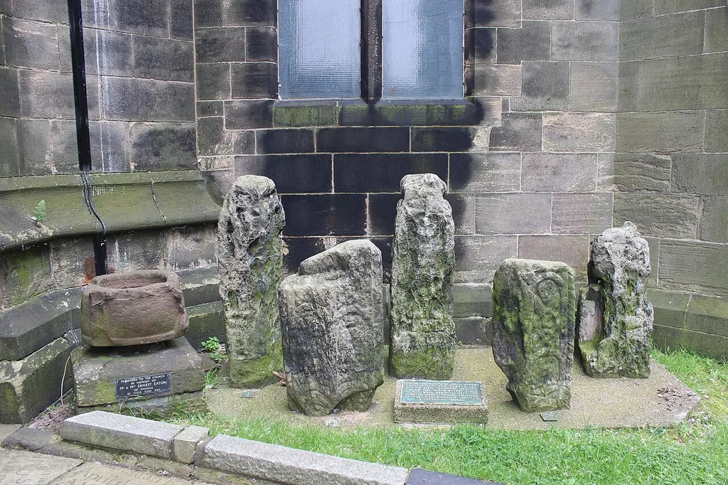 Fragments of Anglo-Saxon cross shafts and tomb-slabs outside the main entrance to St Mary's Church, Sandbach. Moved here for safe-keeping in 1956.