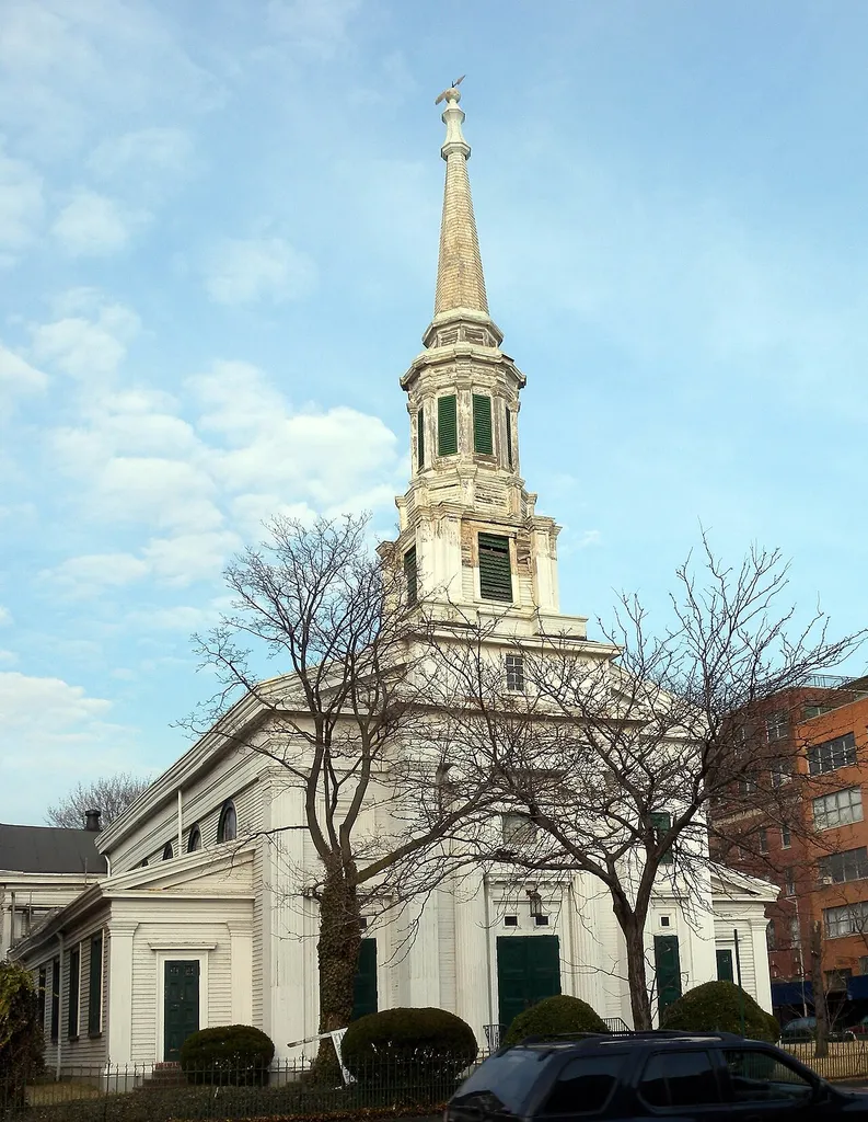 Looking northeast at South Bushwick Reformed Church on a sunny afternoon, seen from west side of Kossuth Street. NYCLPC designation 1968; Guidebook map 13. ZIP 11221.