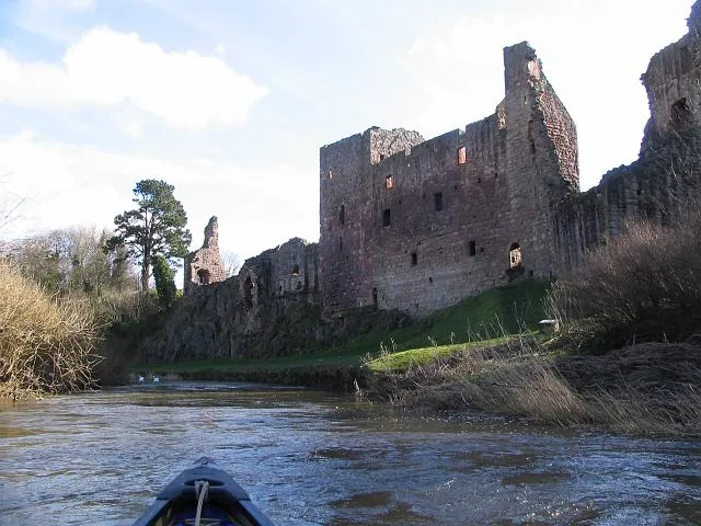Hailes from the River Tyne The swans scoot off down river past Hailes Castle.