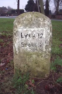 Milestone, opp. village hall, Church Rd