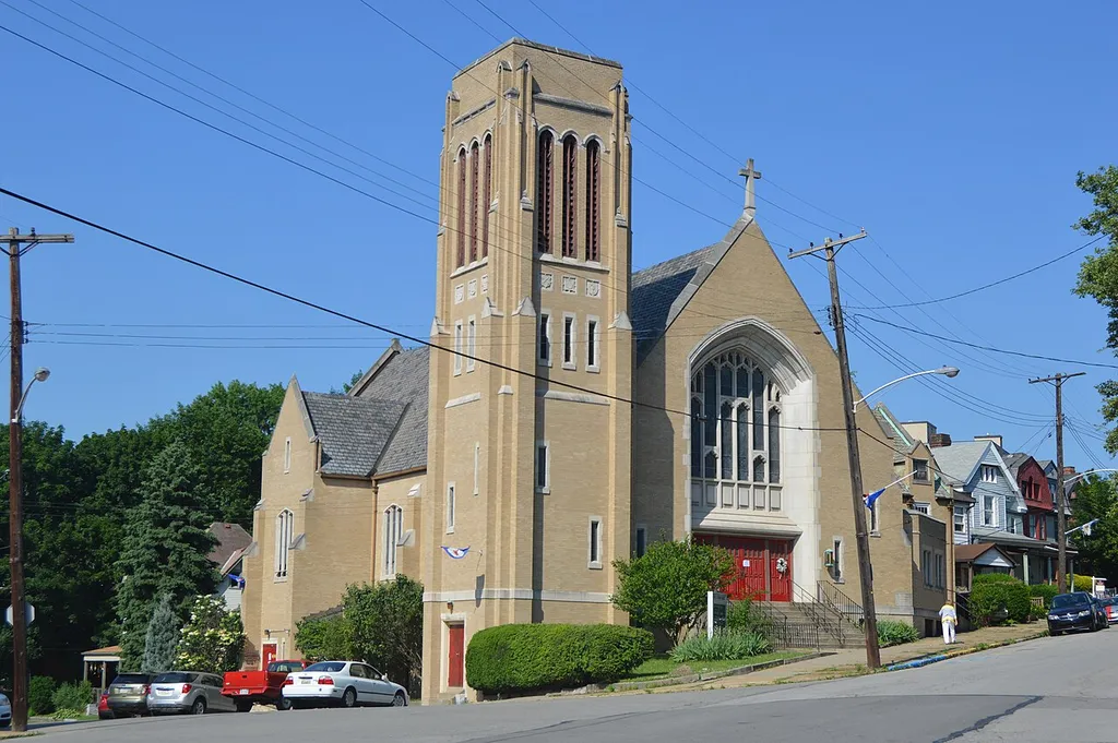 Front and eastern side of Christ's Evangelical Lutheran Church, located at 409 Eleventh Street in Beaver Falls, Pennsylvania, United States. Organized in 1886, the church built its present building in 1888.